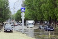 Saratov, RussiaÃ¢â¬â September 03, 2021: Cars drive through large puddles left over from the rain